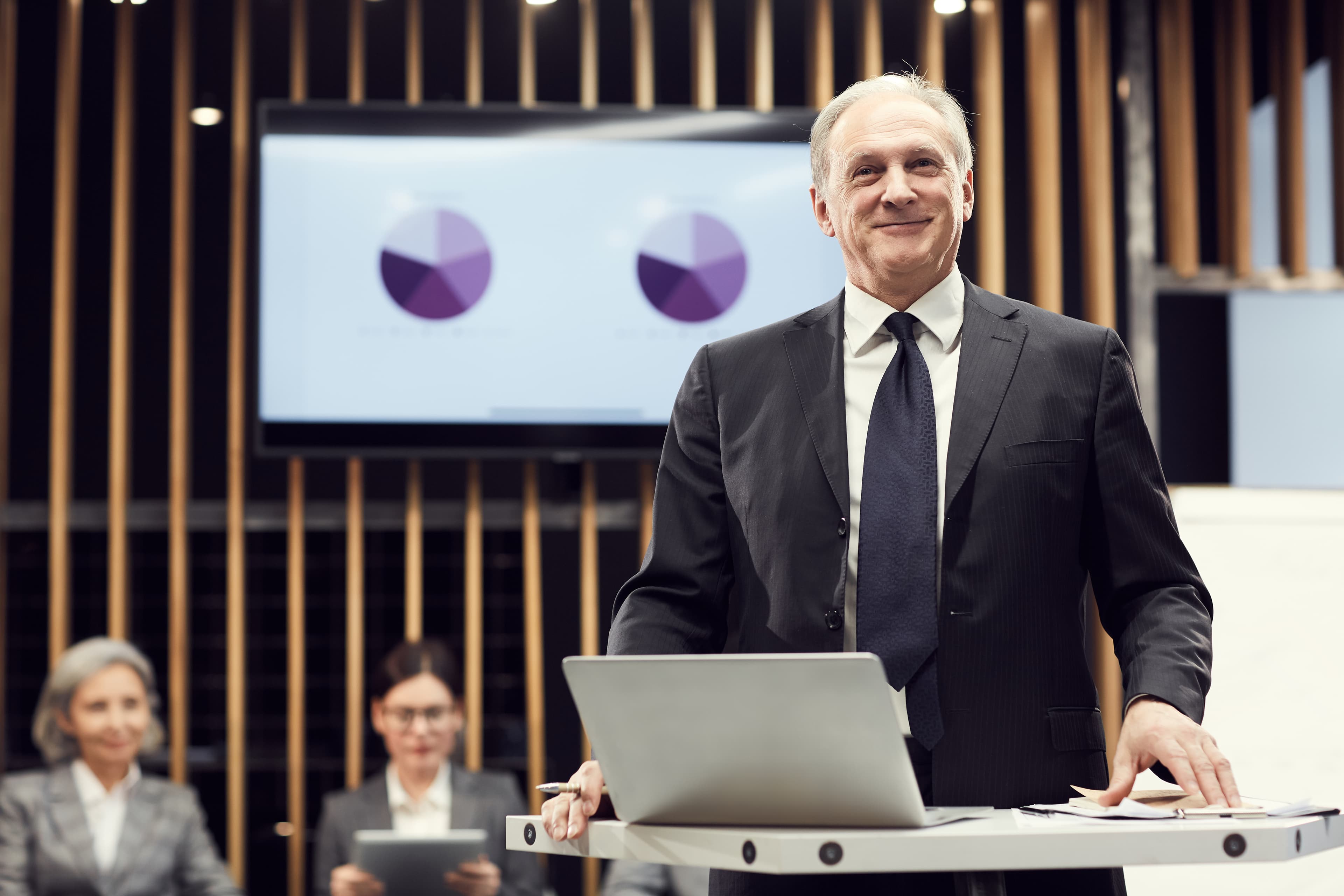 Business owner reviewing short-term loan options on a laptop
